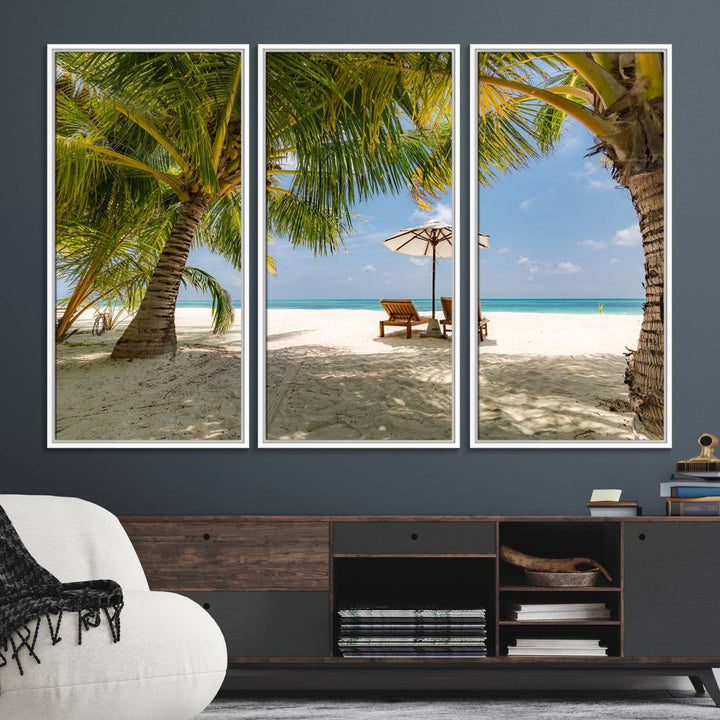 The canvas art print titled Lounge Chairs Palm Trees on Tropical Beach offers free shipping.