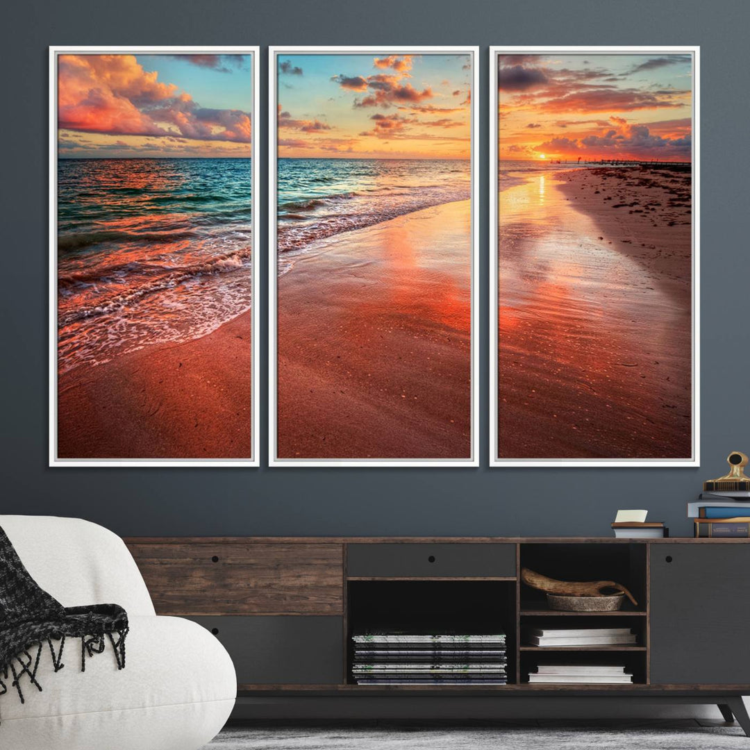 A Vibrant Sunset Beach Canvas Print with ocean waves and sandy shoreline enhances coastal-themed interiors.