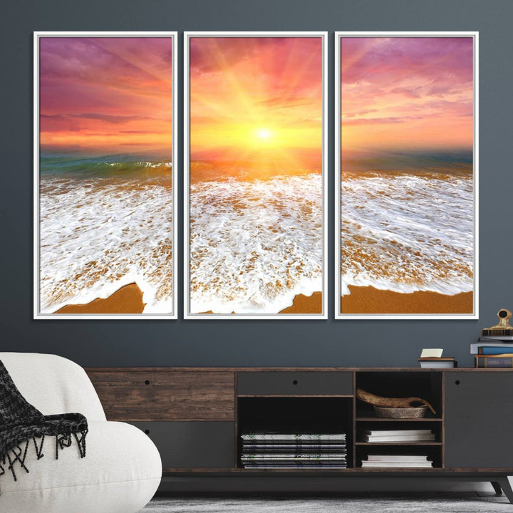 Golden Beach Sunrise 3-panel canvas art of ocean waves, hung on a wooden wall.