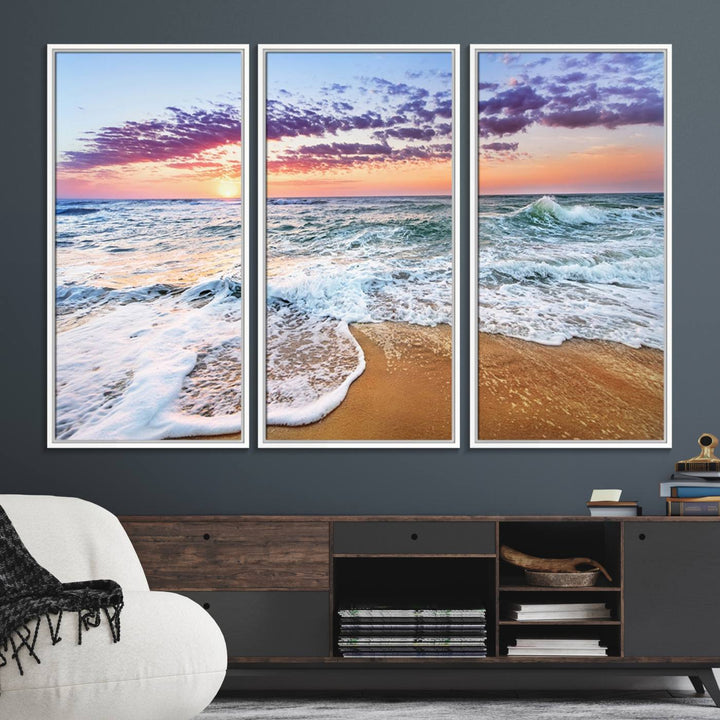 The Vivid Sunset Ocean Waves Triptych hangs on a wooden wall.