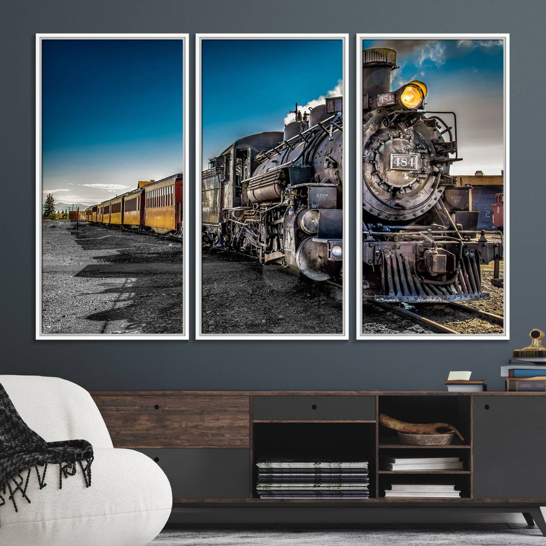 The Train Wall Art Canvas Print features a vintage steam train with a bright headlight.