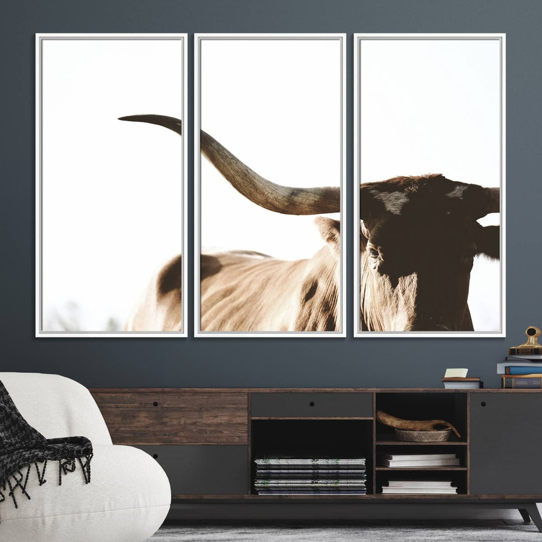 A 3-panel Texas Longhorn canvas adds a touch of rustic Western decor.