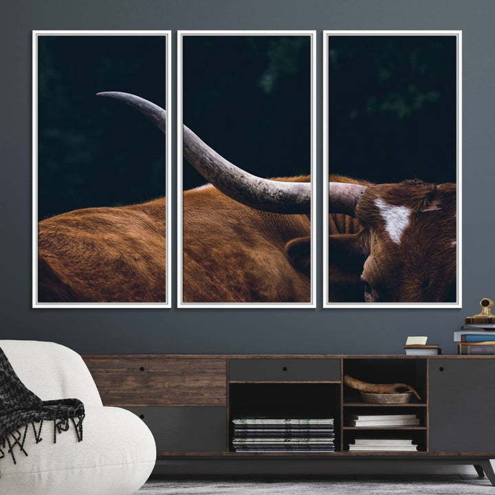 The kitchen dining area features a Texas Longhorn Bull wall art.