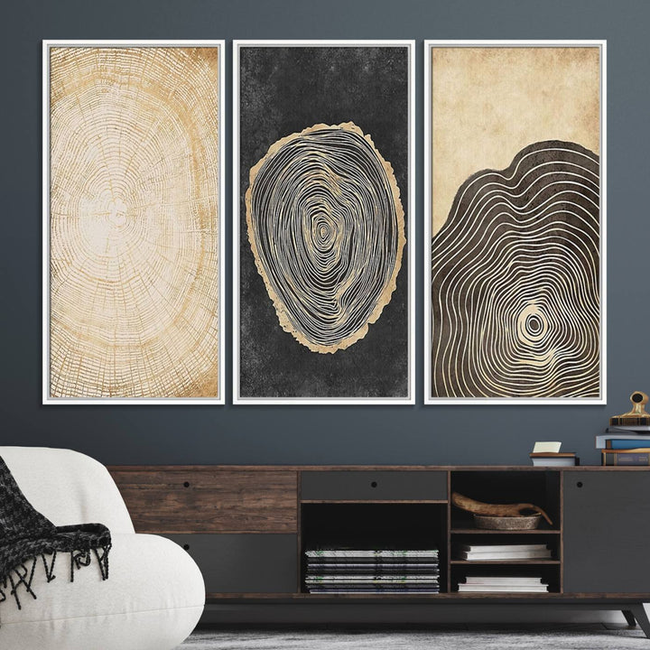 Tree Rings Canvas Wall Art Print hangs prominently in a modern kitchen.