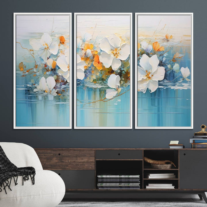 An Abstract Flower Wall Art Canvas Print in blue and orange hues.