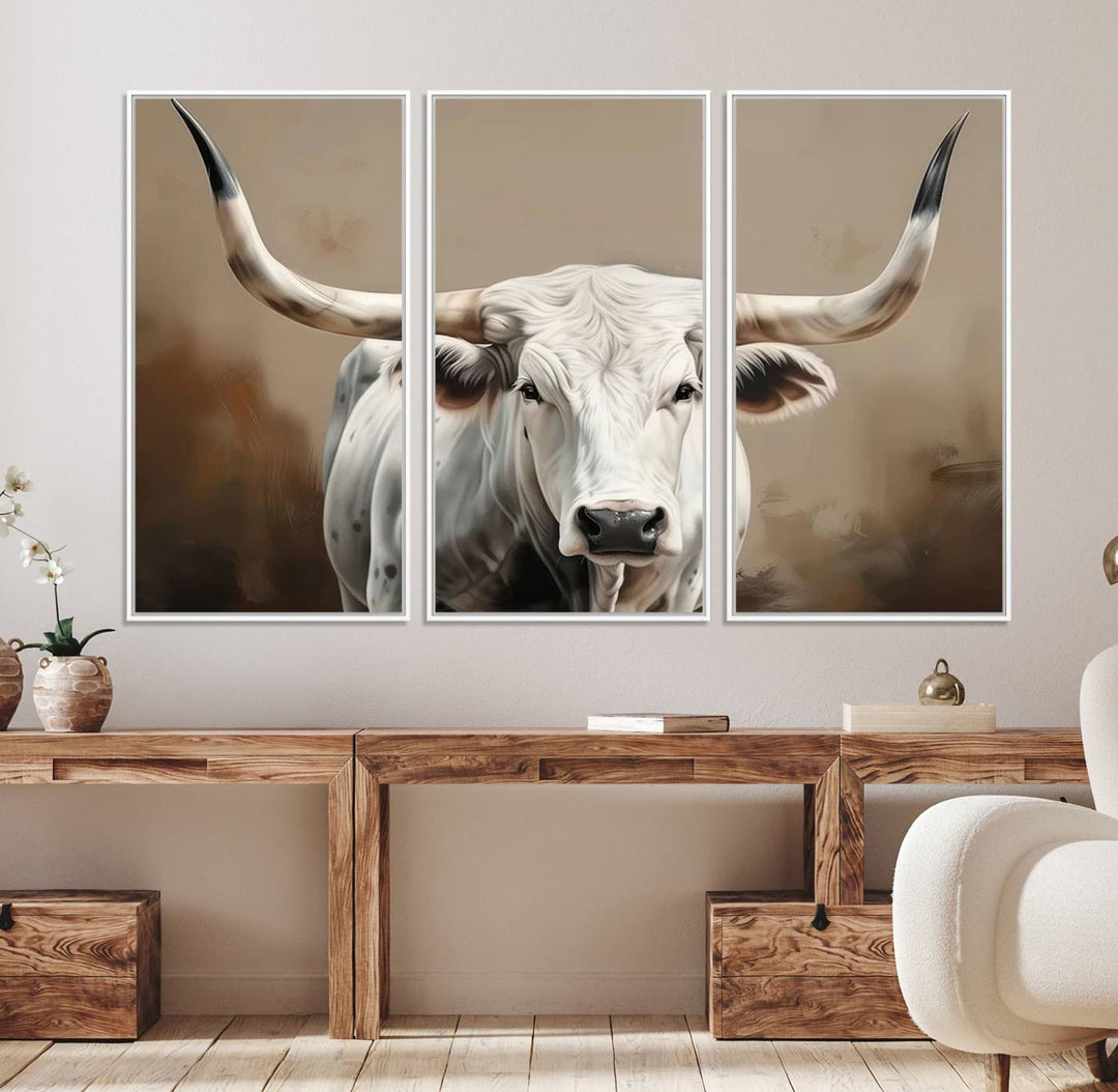 The kitchen features a striking canvas print of a Longhorn Bull.