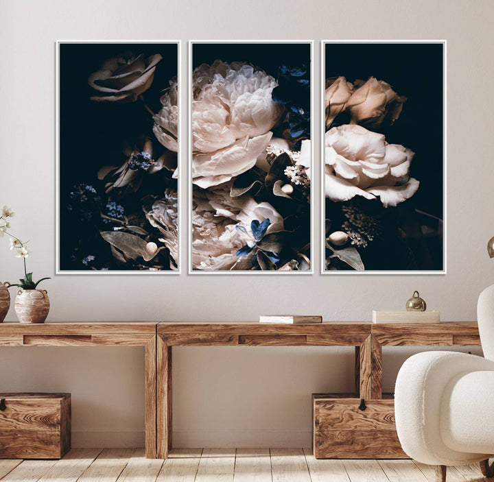 A large canvas art print of pink peonies flowers adds a vibrant touch to the space.