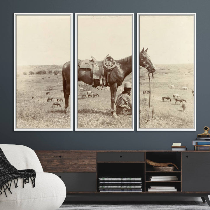 Cowboy Wall Art - Vintage Western Horse Canvas Print features a cowboy kneeling by his horse in a field.