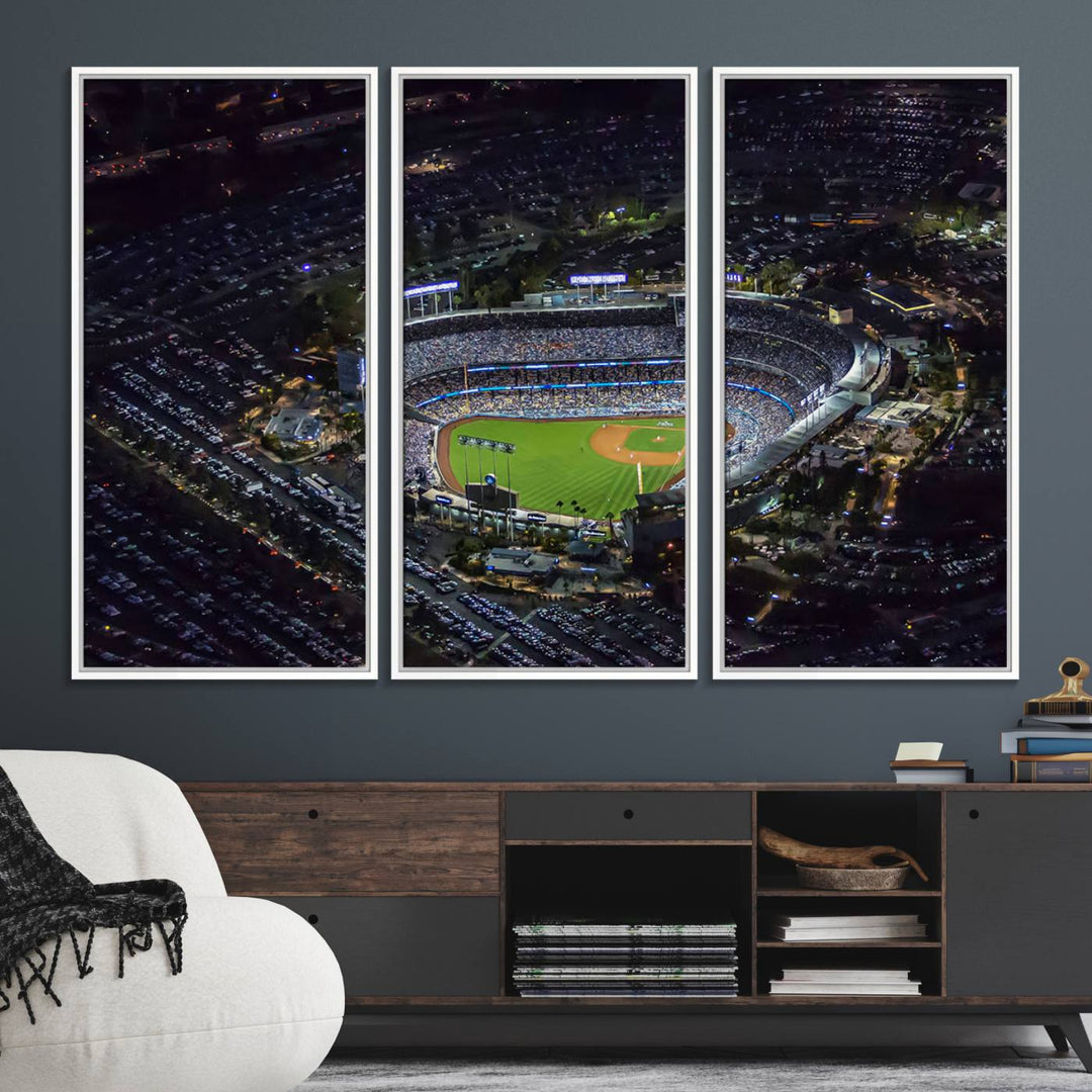 A large Los Angeles Dodgers print of Dodger Stadium at night is displayed near a window.