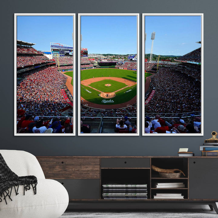 The Cincinnati Reds Baseball Team print of Great American Ball Park Stadium adorns the wall.