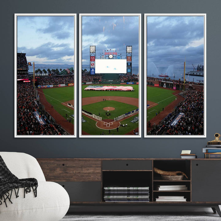 This framed 3-panel canvas MLB wall art features a giant flag and fans under a cloudy sky at Oracle Park.