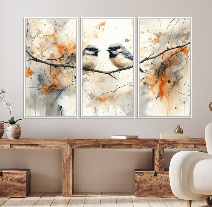 The living room features abstract watercolor chickadee bird art on the wall.