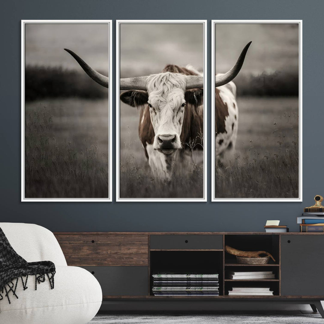 The Texas Longhorn Cow Canvas Wall Art Print adds a rustic touch to a living room.