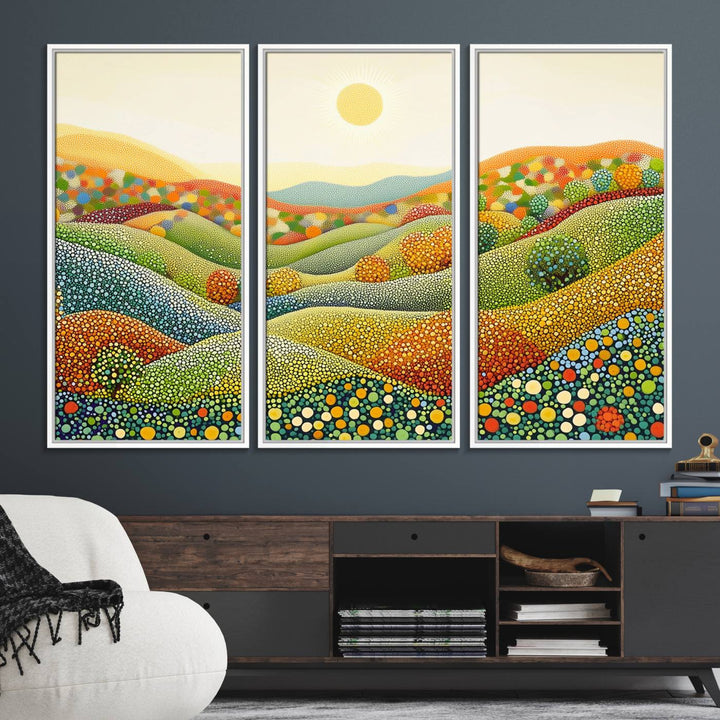 The YAYOI KUSAMA Colorful Dot Art Landscape Canvas, a framed abstract pointillism piece inspired by nature featuring vibrant rolling hills and a sun, adds gallery-quality elegance to your living space.