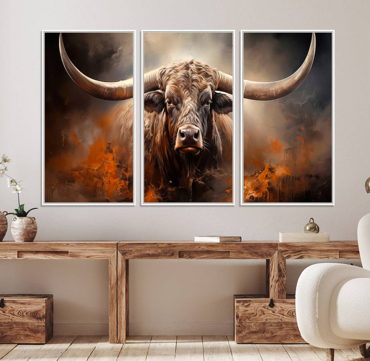 A Highland Bull with striking horns is depicted in a fiery abstract style on a ready-to-hang wall art canvas, evoking strength.