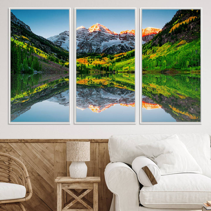 The Sunrise Maroon Bells Lake Wall Art Print beautifully captures North Maroon Peak mirrored in the tranquil lake, framed by lush greenery.