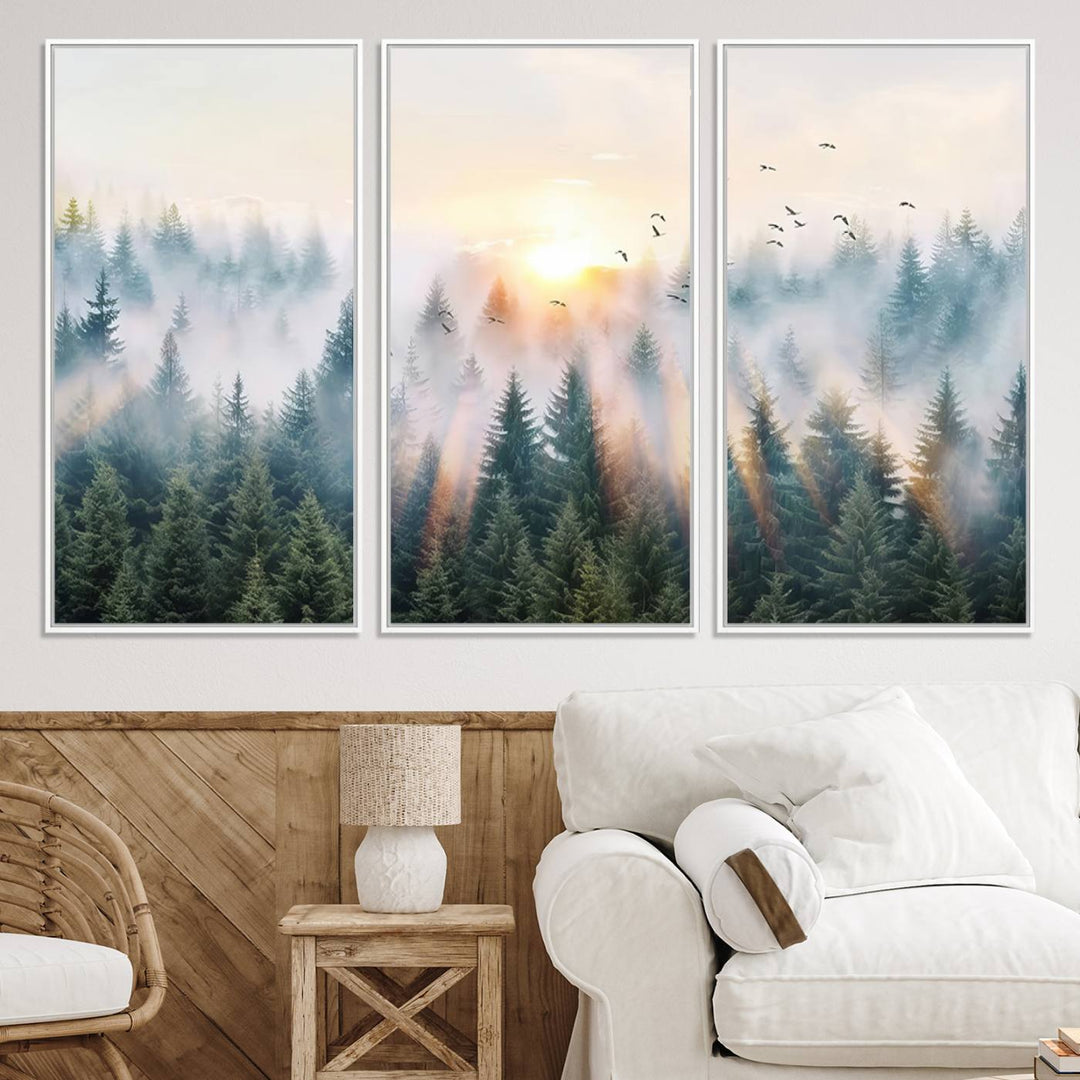 Misty Pine Forest Wall Art: A depiction of sunrise over foggy trees and birds against a bright sky; a framed woodland scene ideal for home or office decor.