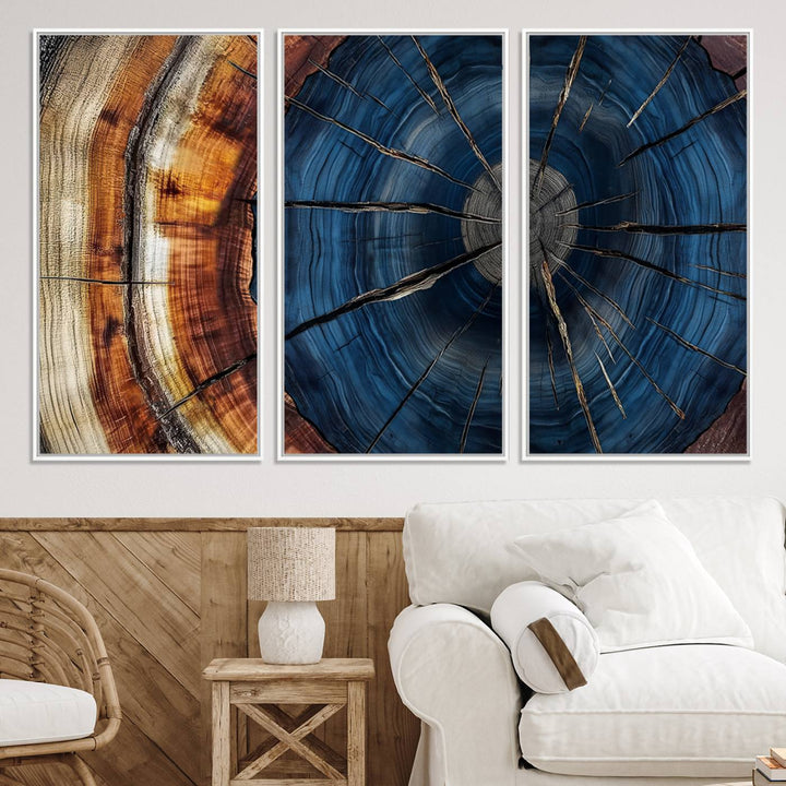 The Abstract Tree Rings Canvas Print features blue, brown, and orange rings that highlight wood grain and natures beauty.