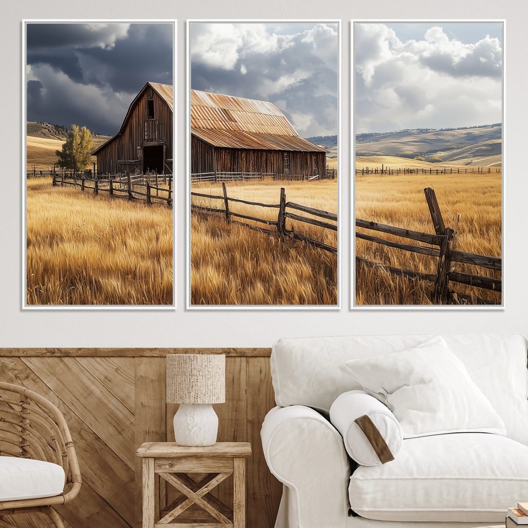 Canvas of a weathered wooden barn in a golden field under a dramatic sky, perfect for rustic or farmhouse-style wall decor.