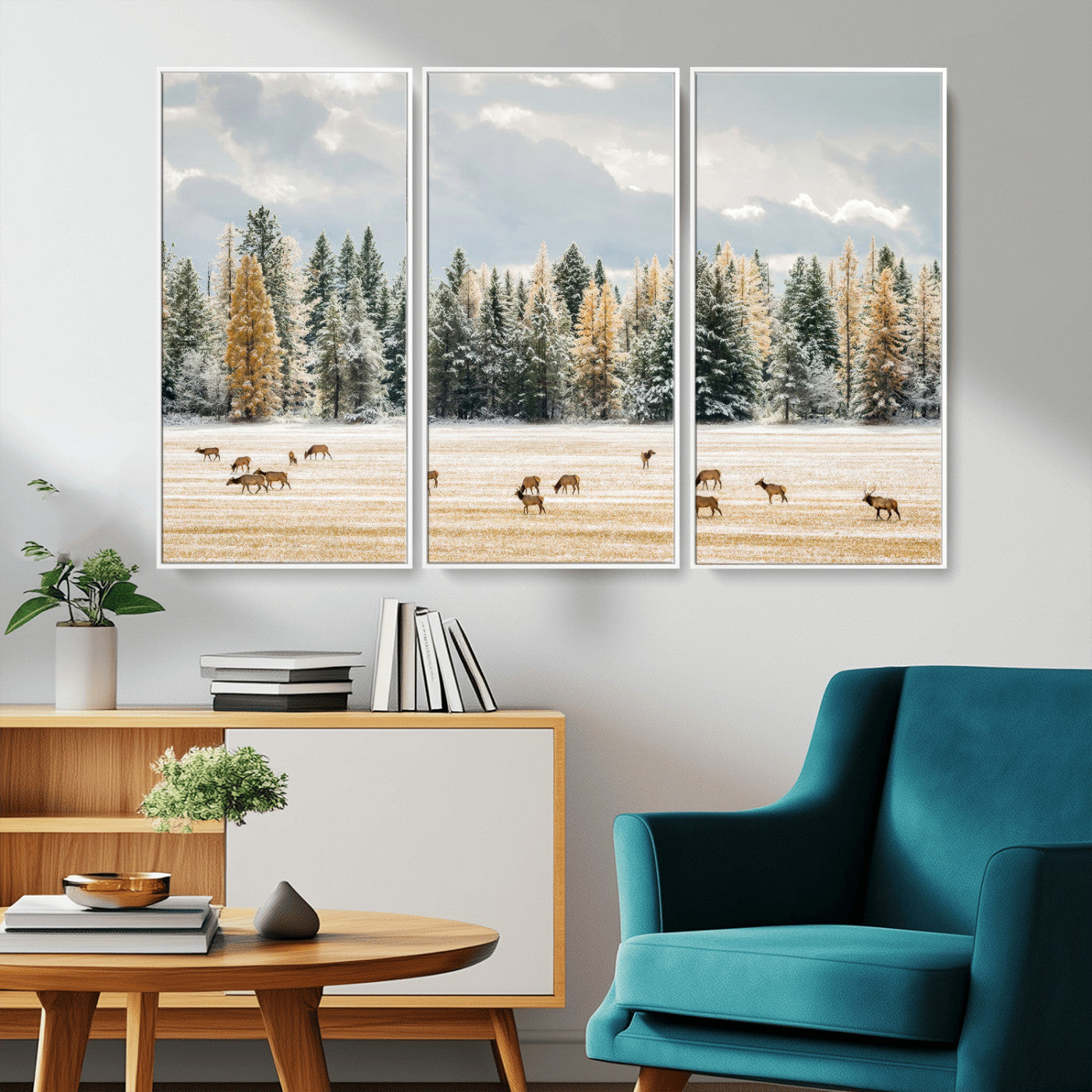 Elk herd in a snowy field with golden pine trees and frosted evergreens, ideal for neutral rustic or cabin-style home decor.