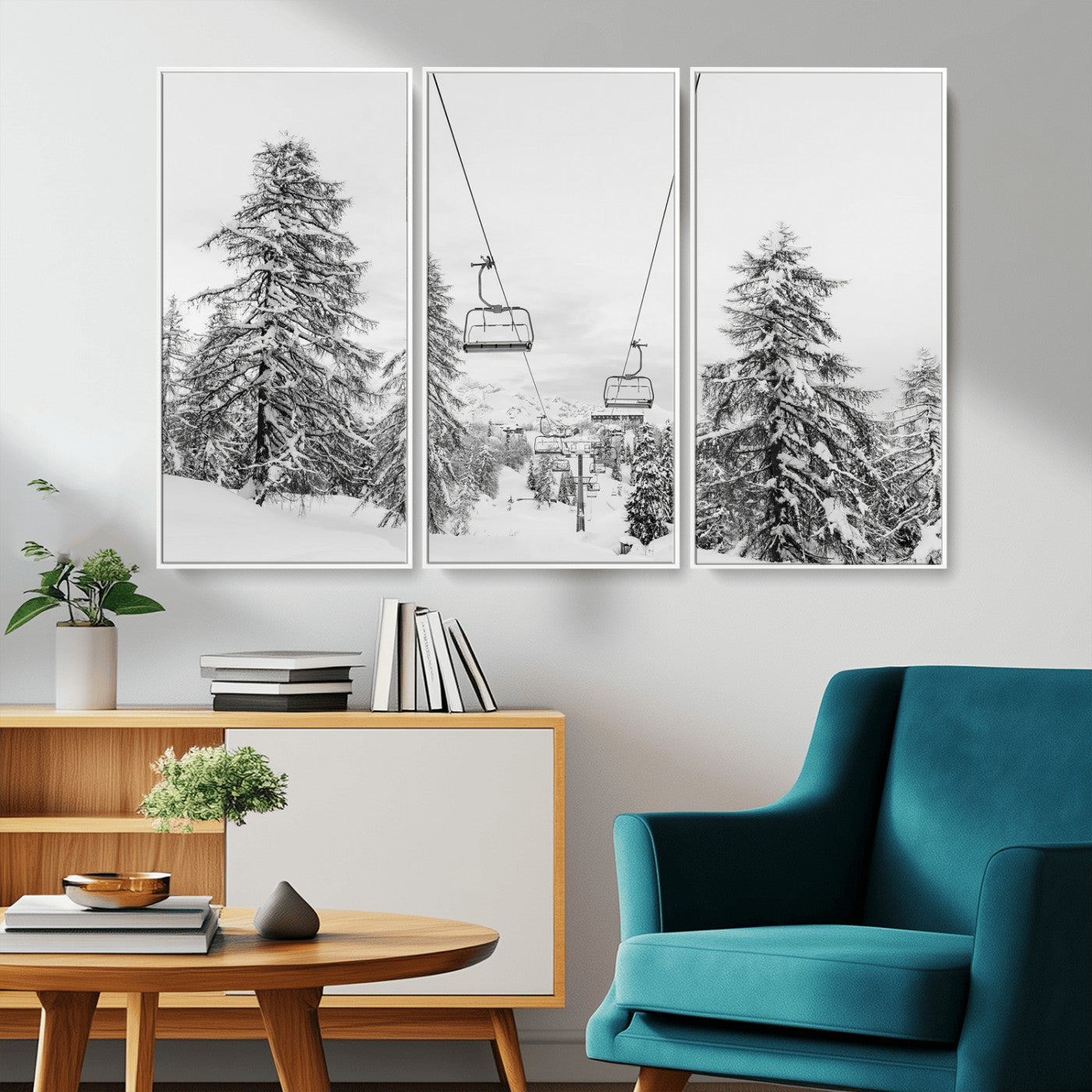 Black and white image of a ski lift amidst snow-covered pine trees, ideal for winter mountain or cabin-themed decor.