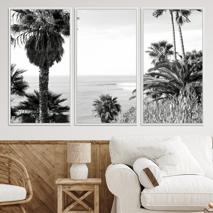 Monochrome canvas of palm trees framing a coastal surf scene, perfect for California-inspired or retro black-and-white beach decor.