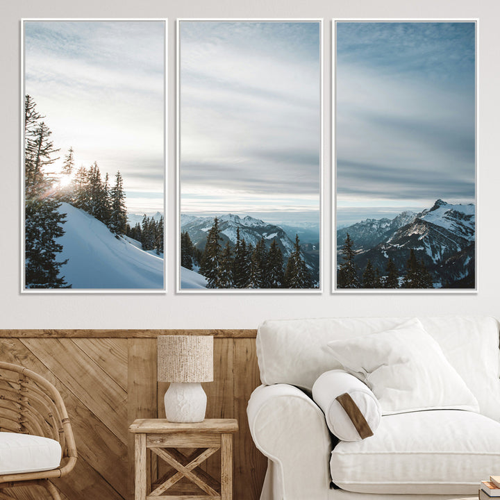 A breathtaking view of snow-covered mountains with evergreen trees and soft sunlight peeking through, creating a serene and peaceful winter scene.