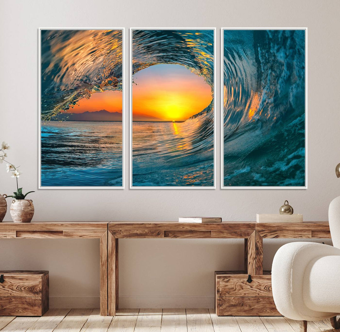 The Ocean Wave Sunset Wall Art canvas print features a vibrant ocean wave at sunset, forming a tunnel with silhouetted mountains.