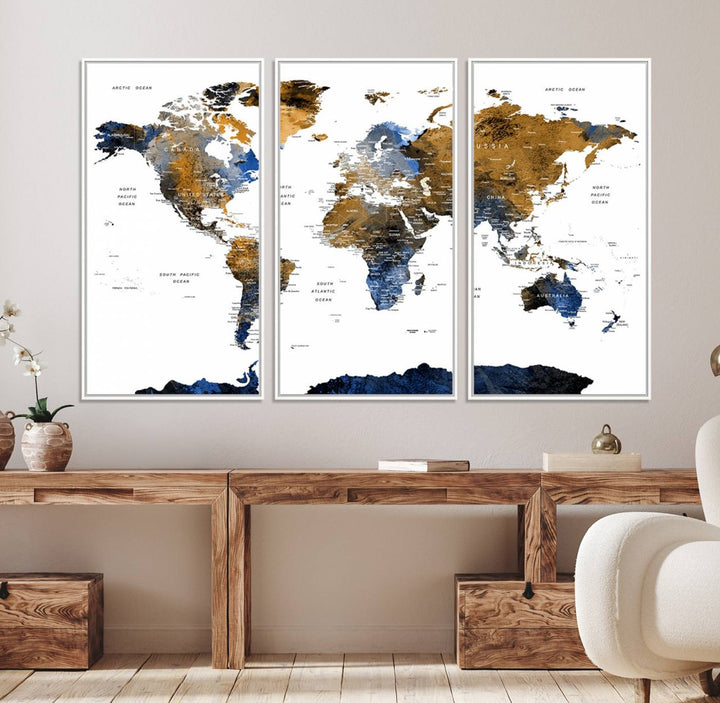 The Triptych Modern World Map Canvas in blue and brown is an ideal global decor piece for enhancing living rooms or offices. It comes ready to hang.