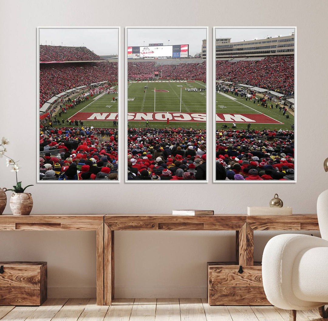 The wall art depicts WISCONSIN in red and white, similar to Wisconsin Badgers Football Canvas Art.