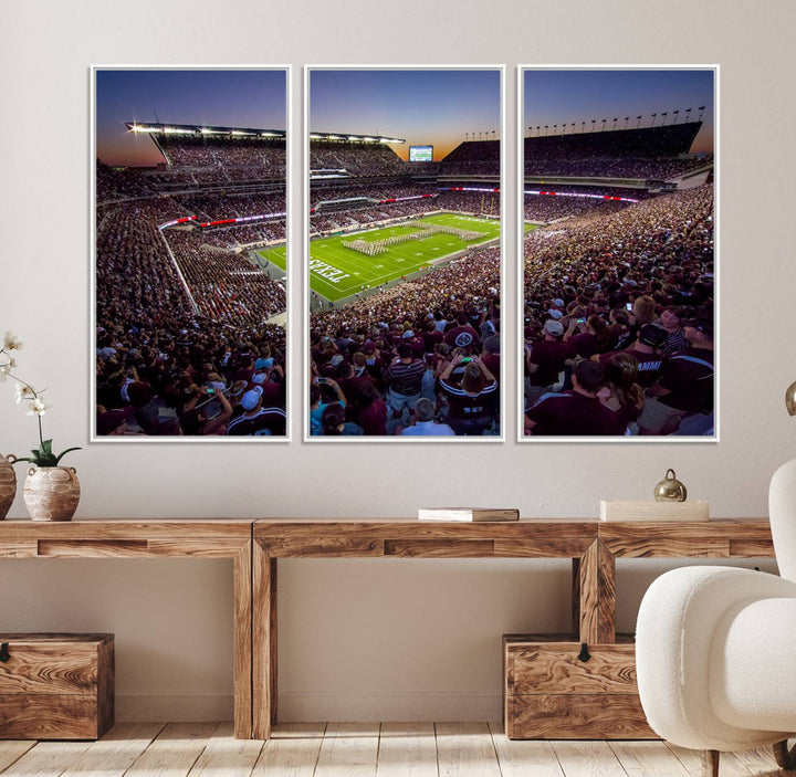 A vibrant canvas print of Texas A&M Aggies at College Stations Kyle Field Stadium captures the energy of fans cheering as the band marches at sunset.