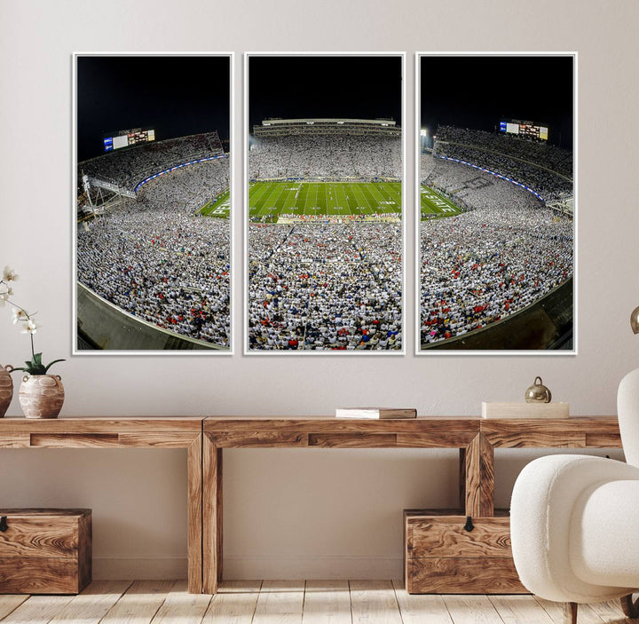 The triple canvas wall art depicts Beaver Stadiums vibrant atmosphere during a night game from the end zone.