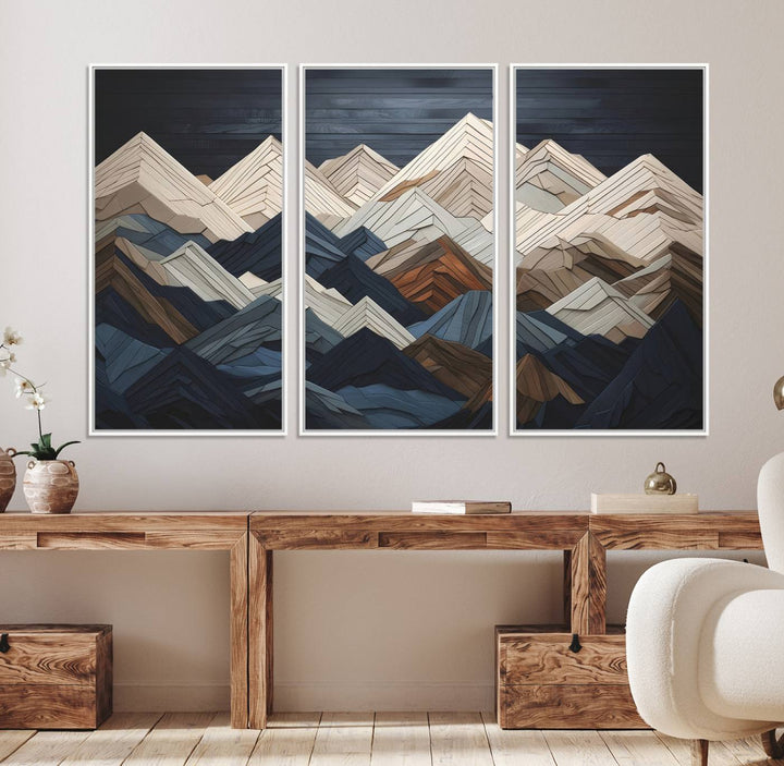 Abstract wood mountain range wall art in a 3-piece set featuring shades of blue, brown, and cream, ideal for modern rustic decor.