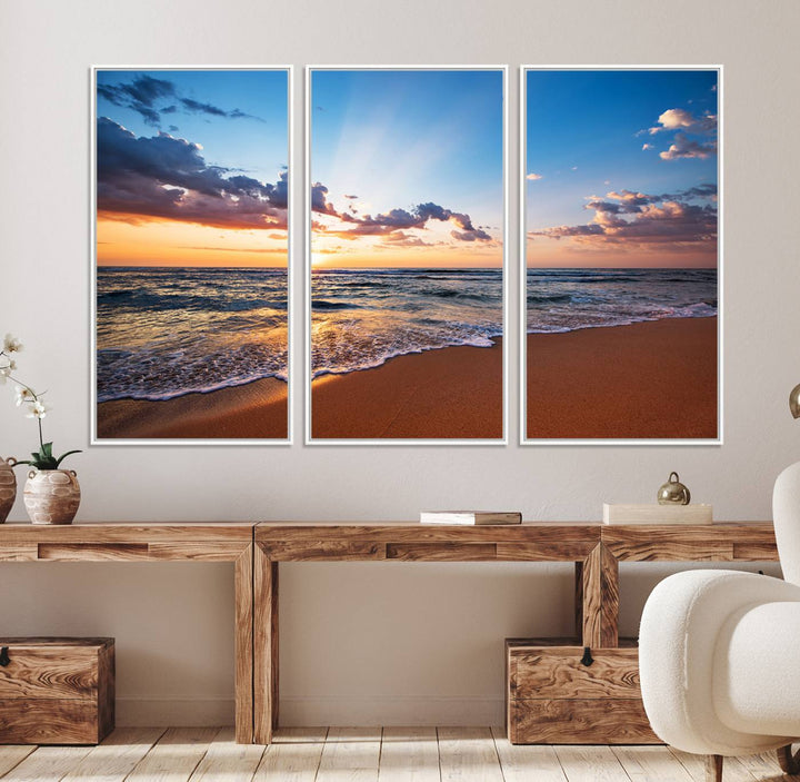 A Golden Hour Beach Sunset canvas hangs in the living room.