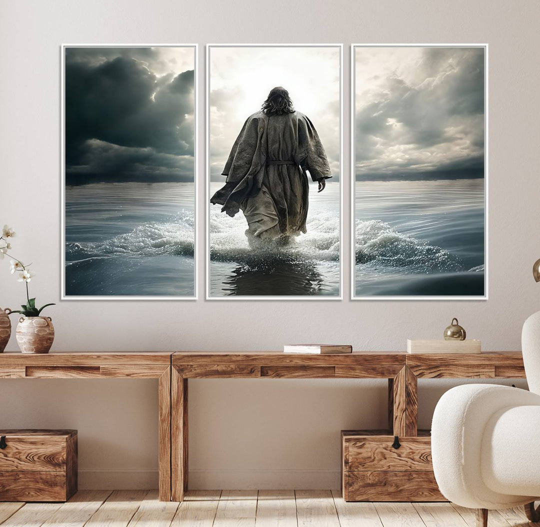 A canvas wall art depicting a figure walking on water beneath dramatic clouds, designed as inspirational religious imagery and ready to hang.