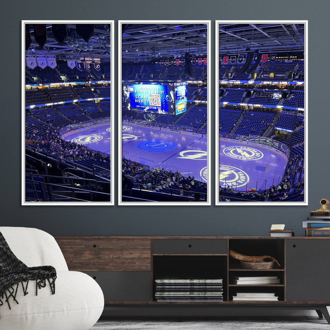 The wall art canvas print at Amalie Arena features team logos on ice, encapsulating the vibrant atmosphere of an NHL hockey stadium.