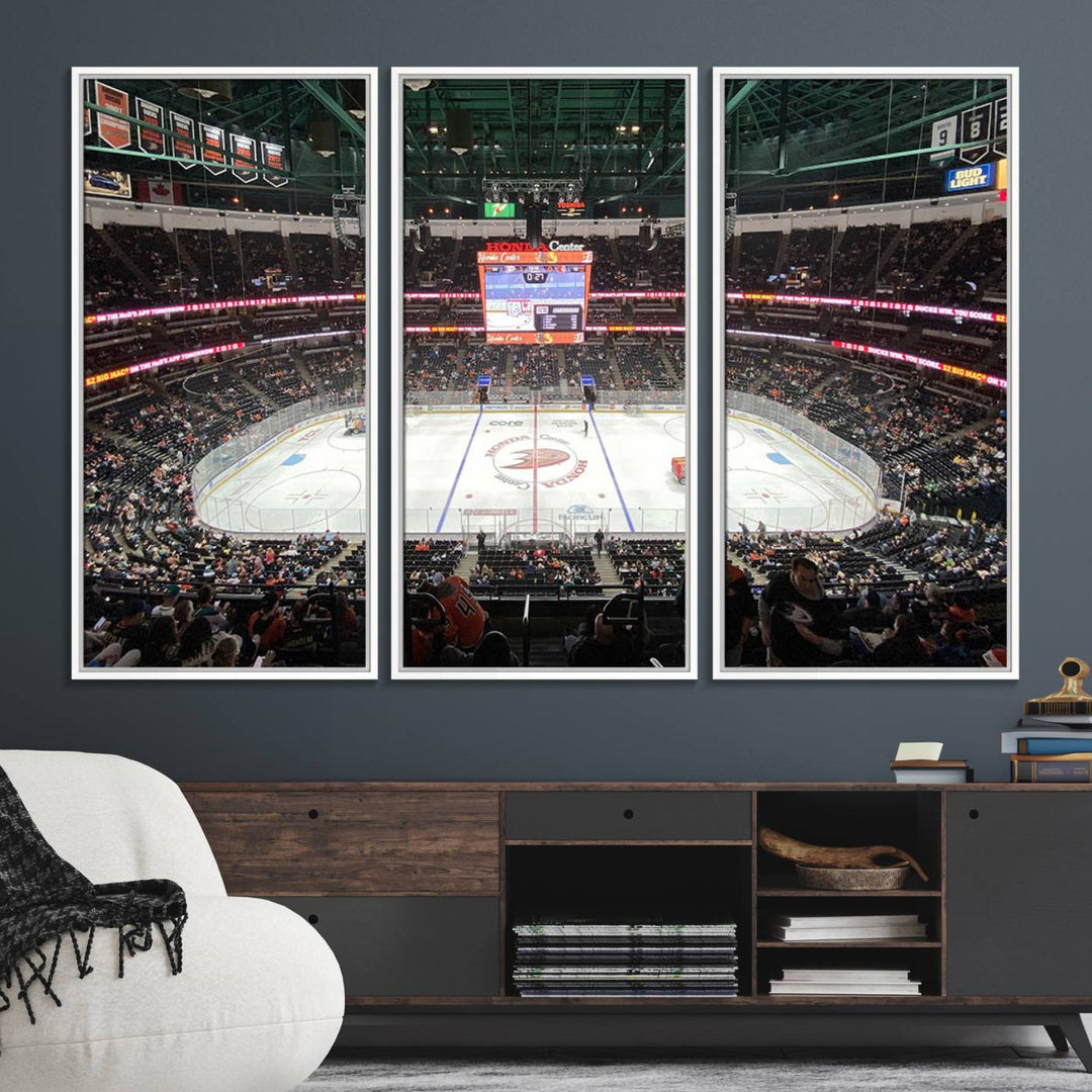 The wall art of the Honda Center California Anaheim Ducks Ice Hockey Stadium features a depiction of the rink and scoreboard from the perspective of the upper deck.