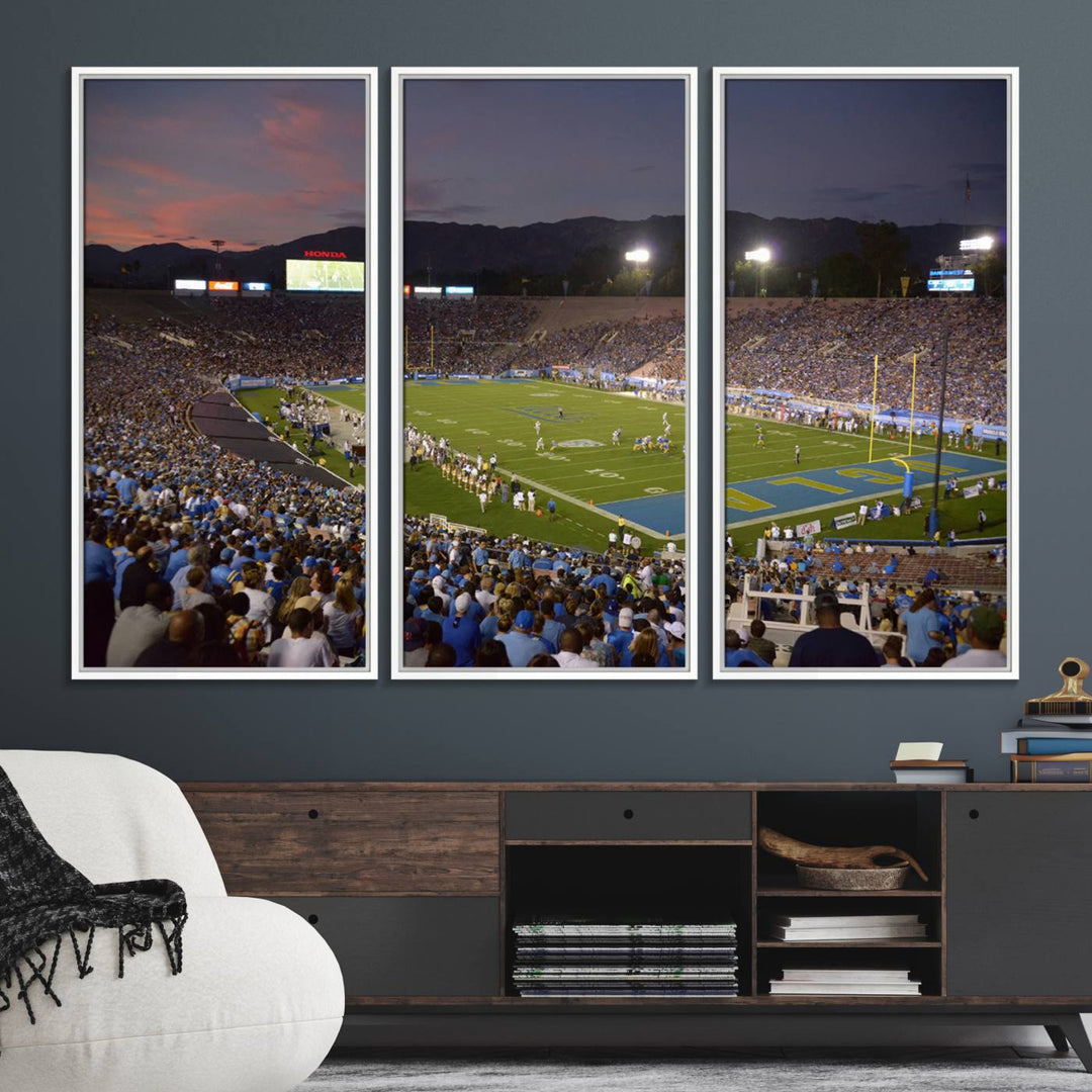 Admire the stunning wall art canvas depicting a UCLA Bruins game with a sunset over the Pasadena Rose Bowl Stadium.