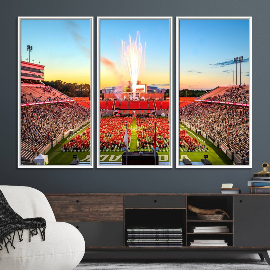 A vibrant North Carolina State University Wolfpack print, capturing a people-filled stadium, fireworks, and a sunset—perfect for your living room wall.