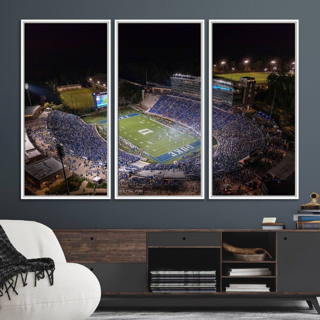 Night aerial view of packed Duke Blue Devils Wallace Wade Stadium, surrounded by trees and illuminated by lights; perfect for high-resolution prints.