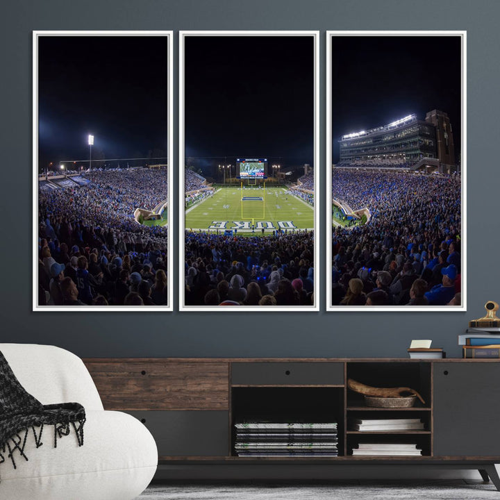 Under bright lights at night, the Duke Blue Devils Football Team Durham canvas wall art print is prominently displayed.