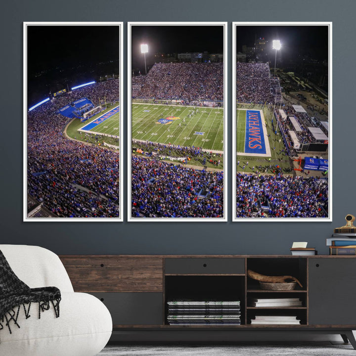 A canvas depicting an aerial view of the University of Kansas Memorial Stadium, showcasing bright lights and a lush green field at night.