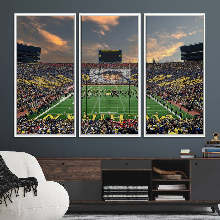 A giant image resembling Michigan Wolverines Wall Art depicts a football field beneath a dramatic sky.