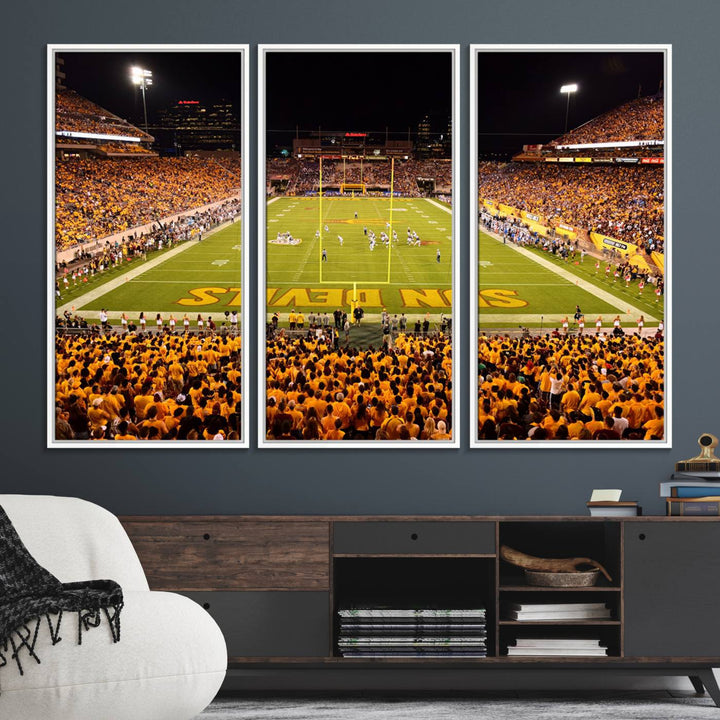 The Phoenix Stadium Canvas Wall Art features a vibrant depiction of a packed stadium filled with ASU Sun Devils fans wearing yellow shirts.