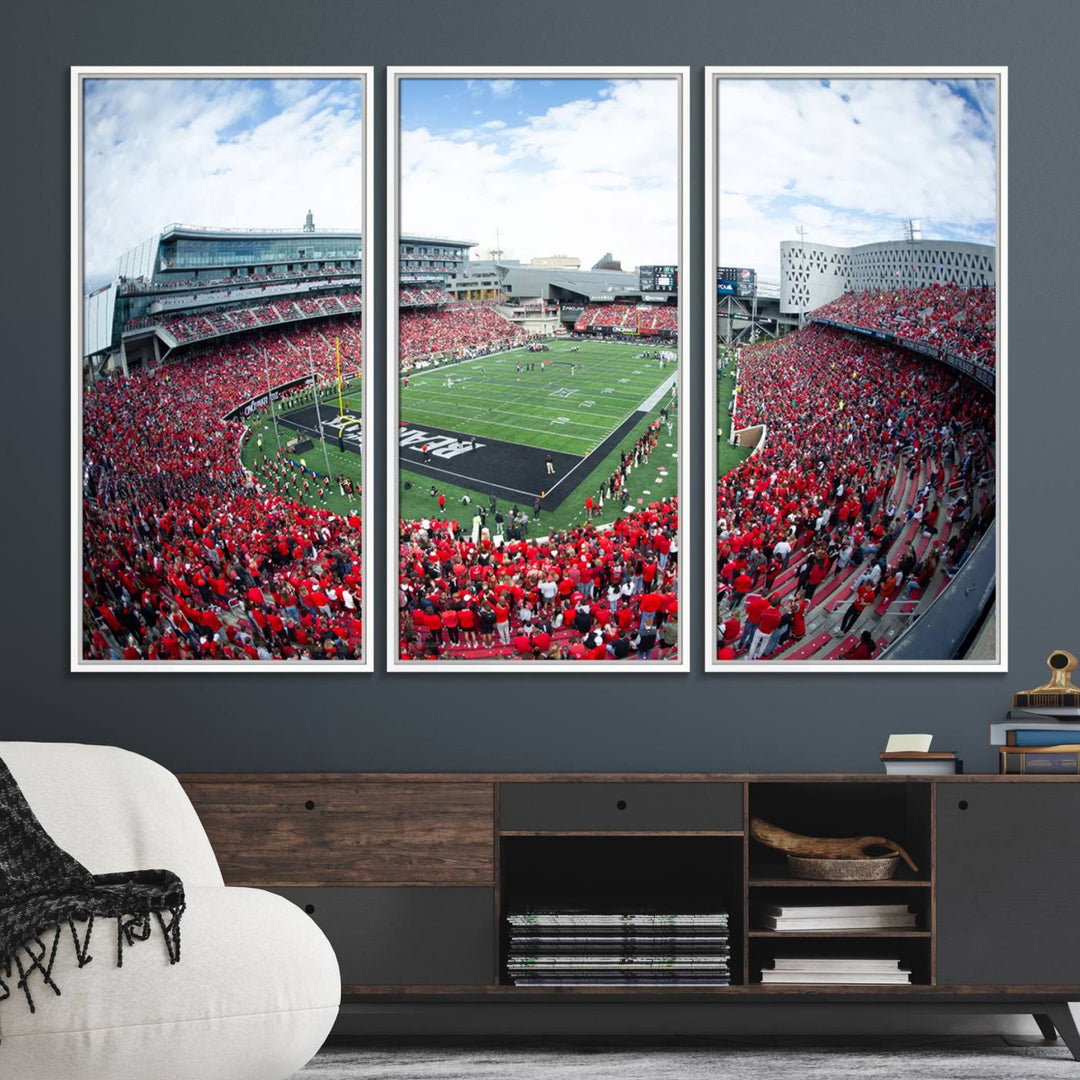 The wall showcases a Nippert Stadium canvas print of the Cincinnati Bearcats.