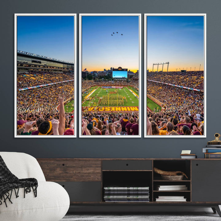 Canvas wall art featuring the University of Minnesota Football Team print, showcasing Huntington Bank Stadium at sunset with jets overhead.