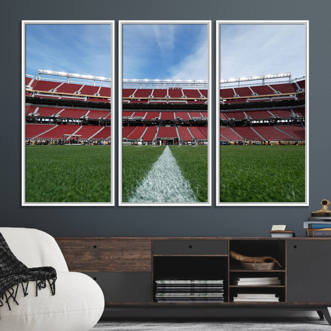 A canvas print of the University of Tulsa Golden Hurricane showcases H.A. Chapman Stadiums football field and red seats against a backdrop of a blue sky.