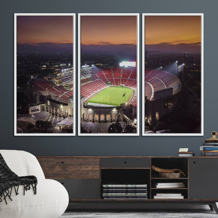 The USC Trojans Stadium canvas captures Memorial Coliseum at twilight, showcasing red seats and a green field beneath an orange sky.