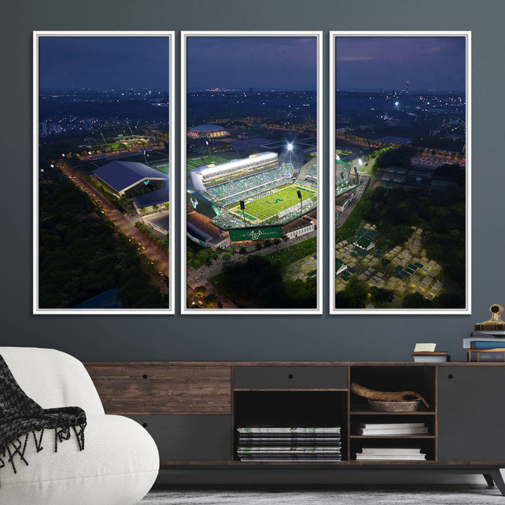 The USF Bulls Football Team Wall Art Canvas Print showcases the Tampa USF Football Stadium at night with city lights.