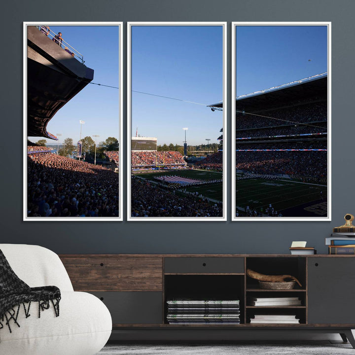 The University of Washington Huskies wall art print depicts Husky Stadium coming alive with fans as flags flutter.